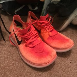 Nike woman’s flynet sneakers size 9